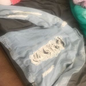 Distressed denim jacket